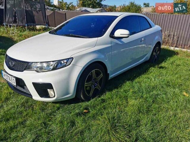 Білий Кіа Черато, об'ємом двигуна 2 л та пробігом 139 тис. км за 9800 $, фото 6 на Automoto.ua