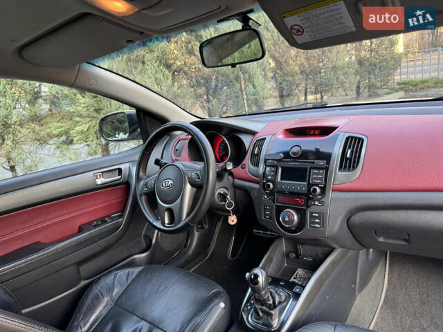 Белый Киа Черато, объемом двигателя 2 л и пробегом 195 тыс. км за 7800 $, фото 10 на Automoto.ua