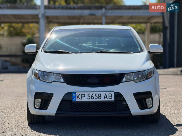 Белый Киа Черато, объемом двигателя 2 л и пробегом 220 тыс. км за 8200 $, фото 1 на Automoto.ua