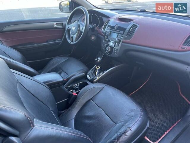 Білий Кіа Черато, об'ємом двигуна 2 л та пробігом 235 тис. км за 7700 $, фото 8 на Automoto.ua