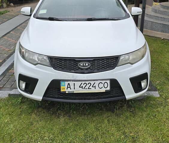 Белый Киа Черато, объемом двигателя 2 л и пробегом 310 тыс. км за 5000 $, фото 3 на Automoto.ua