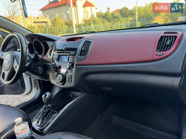 Белый Киа Черато, объемом двигателя 2 л и пробегом 135 тыс. км за 8400 $, фото 27 на Automoto.ua