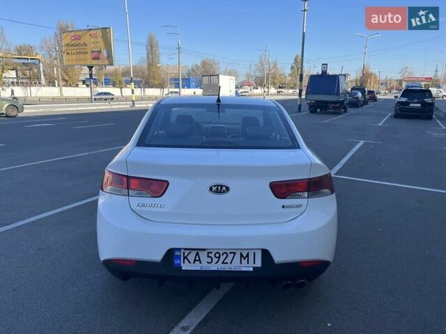 Білий Кіа Черато, об'ємом двигуна 2 л та пробігом 235 тис. км за 7700 $, фото 5 на Automoto.ua