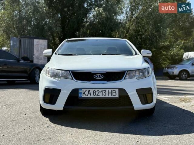 Білий Кіа Черато, об'ємом двигуна 2 л та пробігом 175 тис. км за 6800 $, фото 8 на Automoto.ua