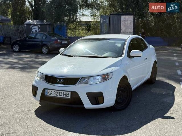 Білий Кіа Черато, об'ємом двигуна 2 л та пробігом 175 тис. км за 6800 $, фото 1 на Automoto.ua