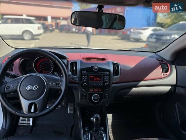 Білий Кіа Черато, об'ємом двигуна 2 л та пробігом 175 тис. км за 6800 $, фото 21 на Automoto.ua