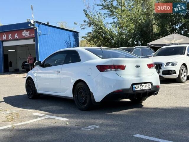 Білий Кіа Черато, об'ємом двигуна 2 л та пробігом 175 тис. км за 6800 $, фото 14 на Automoto.ua