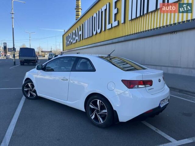 Білий Кіа Черато, об'ємом двигуна 2 л та пробігом 235 тис. км за 7700 $, фото 6 на Automoto.ua