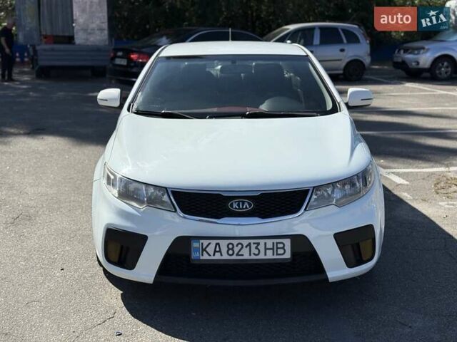 Білий Кіа Черато, об'ємом двигуна 2 л та пробігом 175 тис. км за 6800 $, фото 7 на Automoto.ua