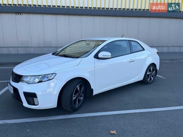 Білий Кіа Черато, об'ємом двигуна 2 л та пробігом 235 тис. км за 7700 $, фото 1 на Automoto.ua