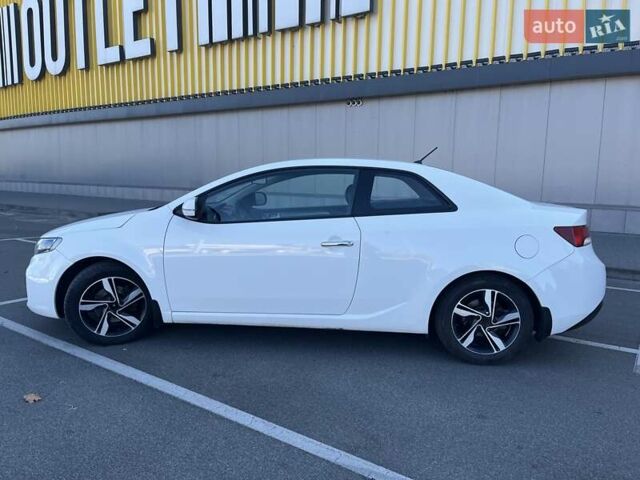 Білий Кіа Черато, об'ємом двигуна 2 л та пробігом 235 тис. км за 7700 $, фото 7 на Automoto.ua