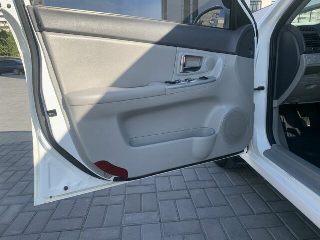 Білий Кіа Черато, об'ємом двигуна 2 л та пробігом 156 тис. км за 5500 $, фото 10 на Automoto.ua