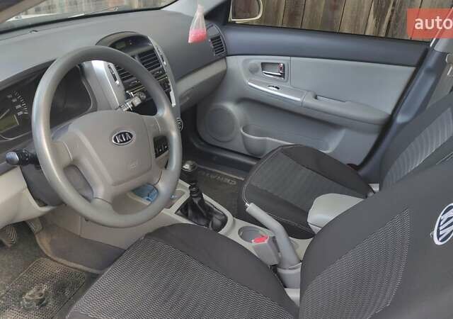 Белый Киа Черато, объемом двигателя 1.6 л и пробегом 144 тыс. км за 5000 $, фото 2 на Automoto.ua