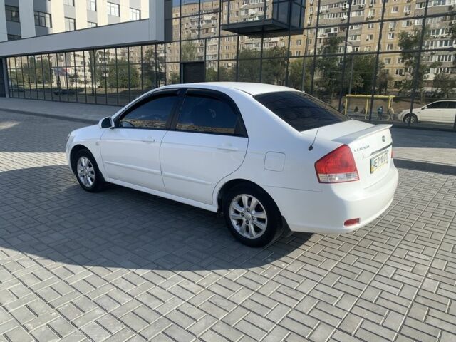 Білий Кіа Черато, об'ємом двигуна 2 л та пробігом 156 тис. км за 5500 $, фото 7 на Automoto.ua