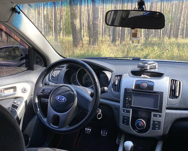 Білий Кіа Черато, об'ємом двигуна 1.6 л та пробігом 168 тис. км за 5800 $, фото 17 на Automoto.ua
