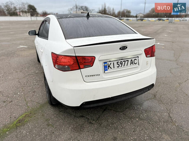 Белый Киа Черато, объемом двигателя 1.59 л и пробегом 168 тыс. км за 4350 $, фото 2 на Automoto.ua