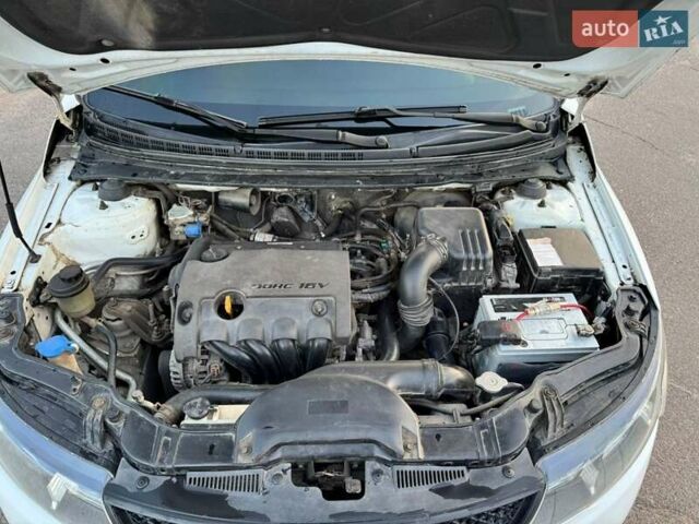 Белый Киа Черато, объемом двигателя 1.59 л и пробегом 211 тыс. км за 6800 $, фото 11 на Automoto.ua