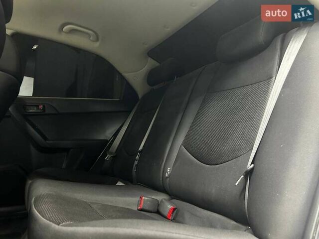 Білий Кіа Черато, об'ємом двигуна 1.59 л та пробігом 180 тис. км за 6300 $, фото 15 на Automoto.ua