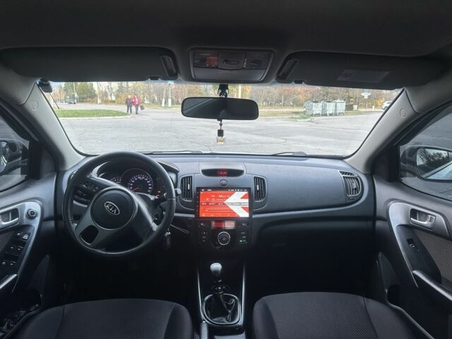 Белый Киа Черато, объемом двигателя 1.6 л и пробегом 154 тыс. км за 7500 $, фото 2 на Automoto.ua