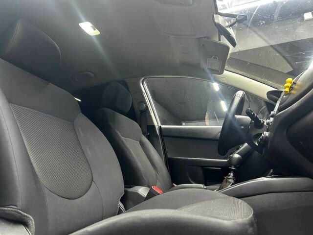 Белый Киа Черато, объемом двигателя 1.6 л и пробегом 180 тыс. км за 6300 $, фото 6 на Automoto.ua