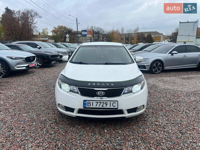 Белый Киа Черато, объемом двигателя 1.59 л и пробегом 210 тыс. км за 8200 $, фото 1 на Automoto.ua