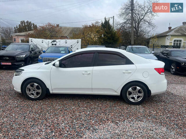 Белый Киа Черато, объемом двигателя 1.59 л и пробегом 210 тыс. км за 8200 $, фото 7 на Automoto.ua
