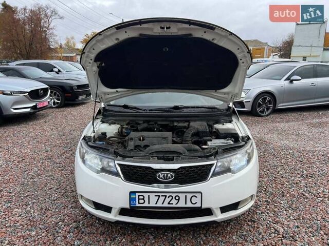 Белый Киа Черато, объемом двигателя 1.59 л и пробегом 210 тыс. км за 8200 $, фото 9 на Automoto.ua