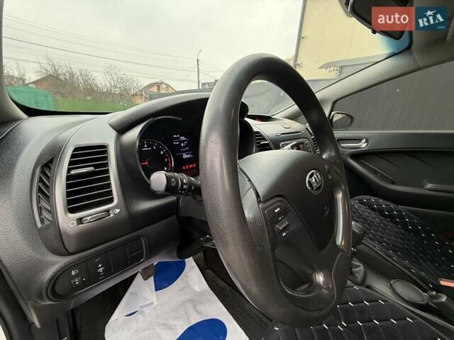 Білий Кіа Черато, об'ємом двигуна 1.6 л та пробігом 100 тис. км за 8300 $, фото 20 на Automoto.ua