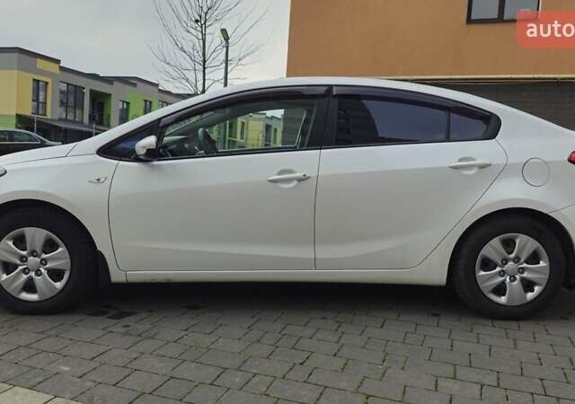Белый Киа Черато, объемом двигателя 1.6 л и пробегом 130 тыс. км за 7700 $, фото 10 на Automoto.ua