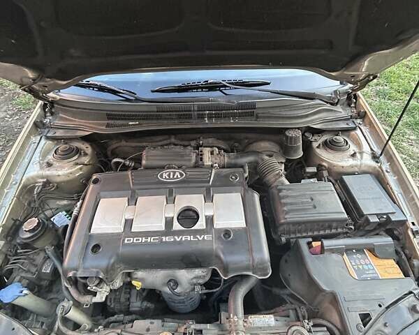 Бежевый Киа Черато, объемом двигателя 1.6 л и пробегом 138 тыс. км за 4400 $, фото 43 на Automoto.ua