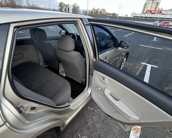 Бежевый Киа Черато, объемом двигателя 1.6 л и пробегом 138 тыс. км за 4400 $, фото 18 на Automoto.ua