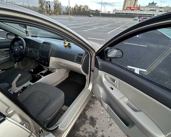 Бежевый Киа Черато, объемом двигателя 1.6 л и пробегом 138 тыс. км за 4400 $, фото 16 на Automoto.ua