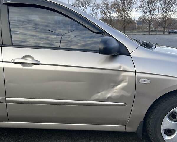 Бежевый Киа Черато, объемом двигателя 1.6 л и пробегом 138 тыс. км за 4400 $, фото 30 на Automoto.ua