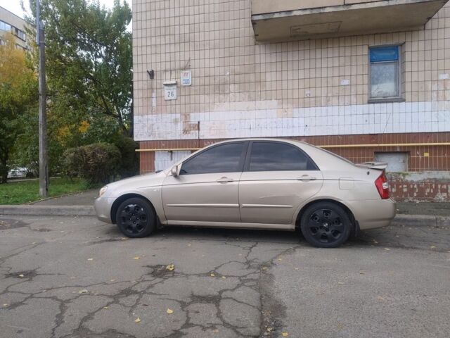 Бежевый Киа Черато, объемом двигателя 1.6 л и пробегом 214 тыс. км за 3050 $, фото 1 на Automoto.ua