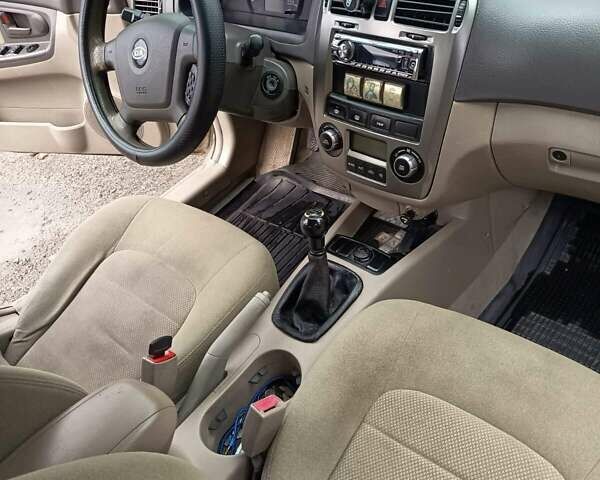 Бежевий Кіа Черато, об'ємом двигуна 2 л та пробігом 187 тис. км за 4700 $, фото 3 на Automoto.ua