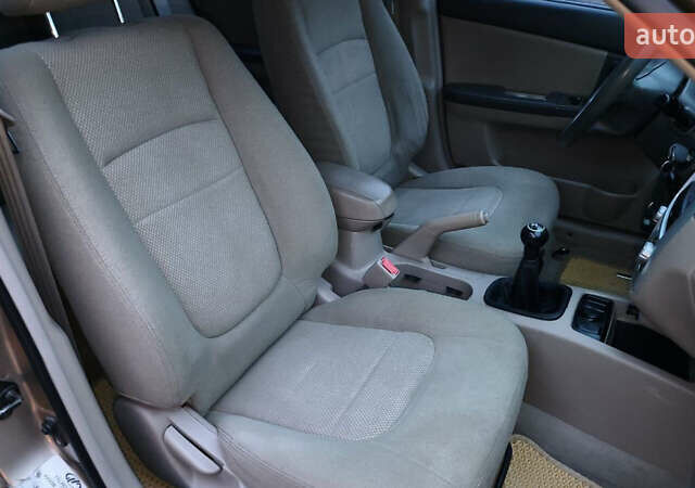 Бежевый Киа Черато, объемом двигателя 1.59 л и пробегом 202 тыс. км за 4800 $, фото 24 на Automoto.ua