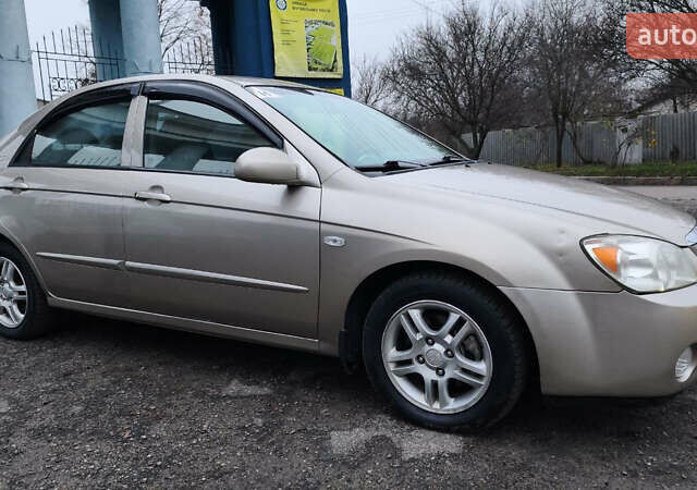 Бежевый Киа Черато, объемом двигателя 1.59 л и пробегом 202 тыс. км за 4800 $, фото 14 на Automoto.ua