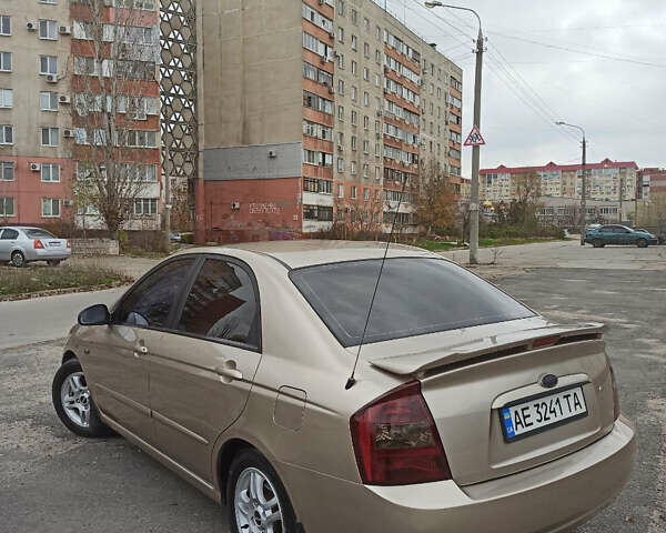 Бежевый Киа Черато, объемом двигателя 1.98 л и пробегом 212 тыс. км за 4500 $, фото 4 на Automoto.ua