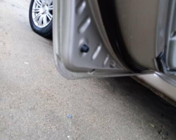 Бежевий Кіа Черато, об'ємом двигуна 1.6 л та пробігом 300 тис. км за 4300 $, фото 7 на Automoto.ua