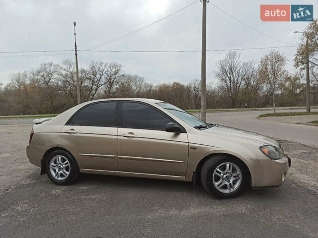 Бежевый Киа Черато, объемом двигателя 1.98 л и пробегом 212 тыс. км за 4500 $, фото 2 на Automoto.ua