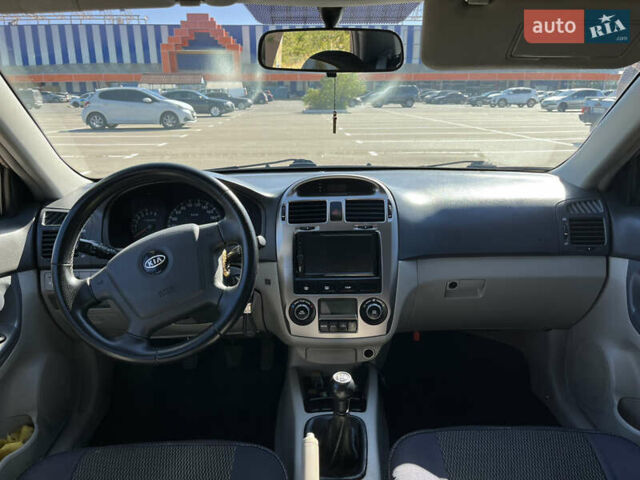 Бежевый Киа Черато, объемом двигателя 2 л и пробегом 160 тыс. км за 4400 $, фото 9 на Automoto.ua