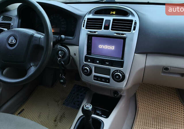 Бежевый Киа Черато, объемом двигателя 1.59 л и пробегом 202 тыс. км за 4800 $, фото 32 на Automoto.ua