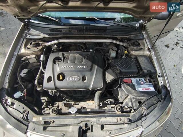 Бежевый Киа Черато, объемом двигателя 1.6 л и пробегом 440 тыс. км за 3200 $, фото 12 на Automoto.ua