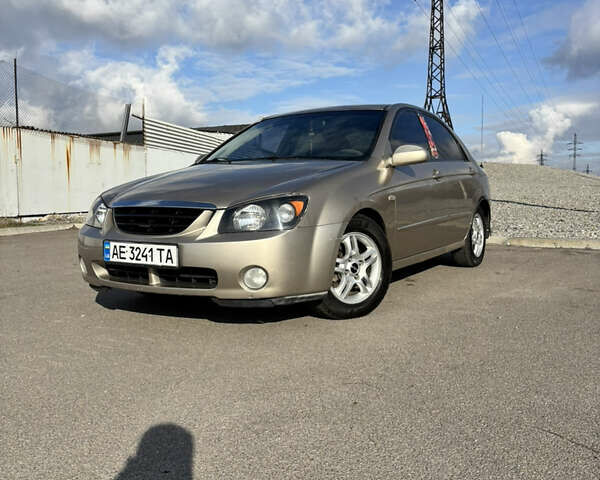 Бежевый Киа Черато, объемом двигателя 2 л и пробегом 208 тыс. км за 3200 $, фото 1 на Automoto.ua