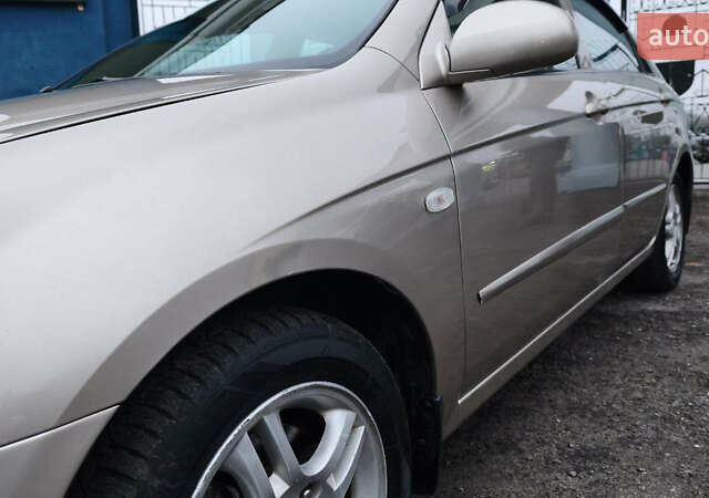 Бежевый Киа Черато, объемом двигателя 1.59 л и пробегом 202 тыс. км за 4800 $, фото 16 на Automoto.ua