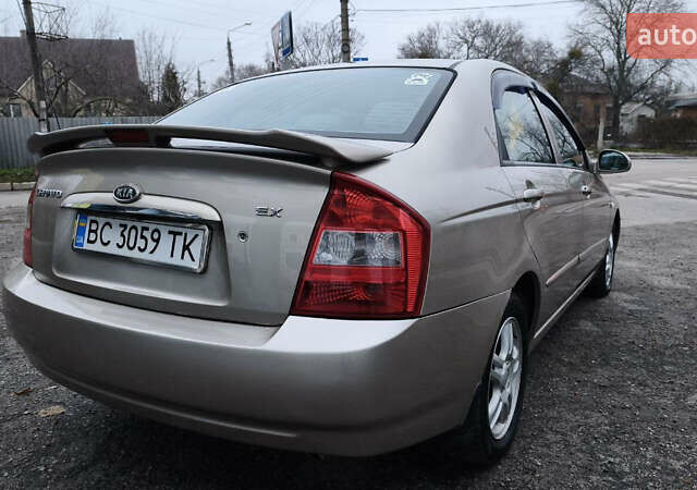 Бежевый Киа Черато, объемом двигателя 1.59 л и пробегом 202 тыс. км за 4800 $, фото 10 на Automoto.ua