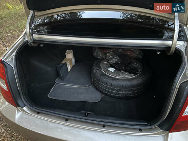 Бежевий Кіа Черато, об'ємом двигуна 1.6 л та пробігом 285 тис. км за 5300 $, фото 29 на Automoto.ua