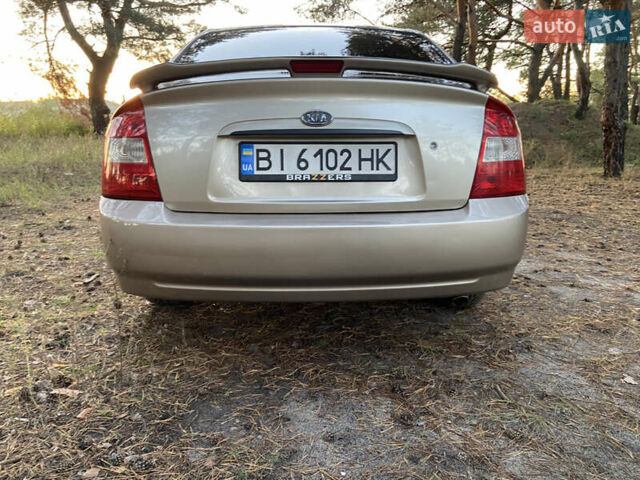 Бежевий Кіа Черато, об'ємом двигуна 1.6 л та пробігом 285 тис. км за 5300 $, фото 8 на Automoto.ua