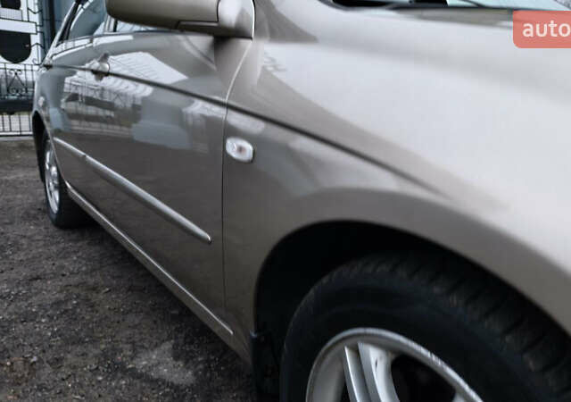 Бежевый Киа Черато, объемом двигателя 1.59 л и пробегом 202 тыс. км за 4800 $, фото 11 на Automoto.ua