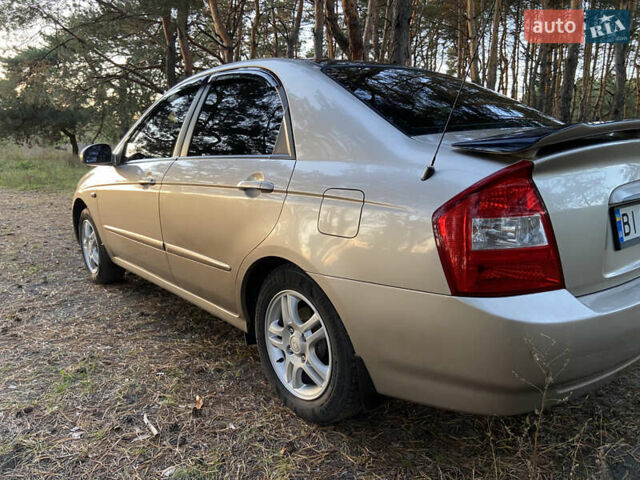 Бежевий Кіа Черато, об'ємом двигуна 1.6 л та пробігом 285 тис. км за 5300 $, фото 11 на Automoto.ua